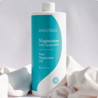 Amazing magnesium spray refill 1L surrounded by white blanket